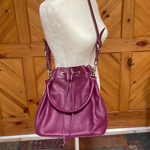 Ora Delphine drawstring bucket purse.